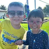 Two MSHS children on playground