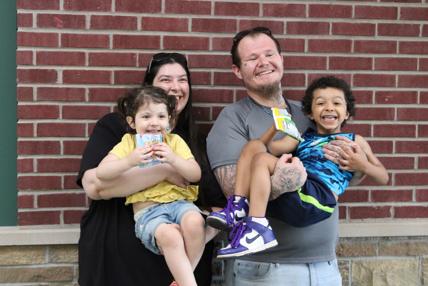 Happy Head Start family pose for a photo at Fostoria Family Development Center